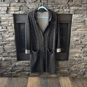 Black‎ with small white flecks .. shacket